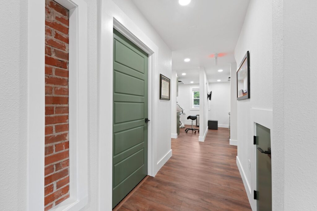 Original preserved brick and chimney detail inside our office